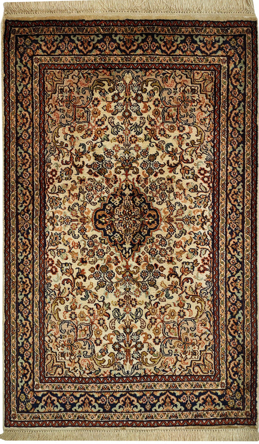 Persian-inspired beige and brown rug with intricate floral patterns and a central medallion, surrounded by a detailed dark border, ideal for adding timeless elegance to interior decor.